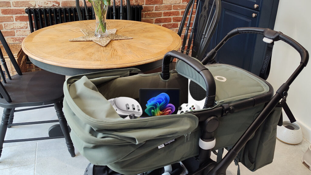 Meta Quest 3S, Surface Pro 12-inch, and Xbox Series S in a push chair