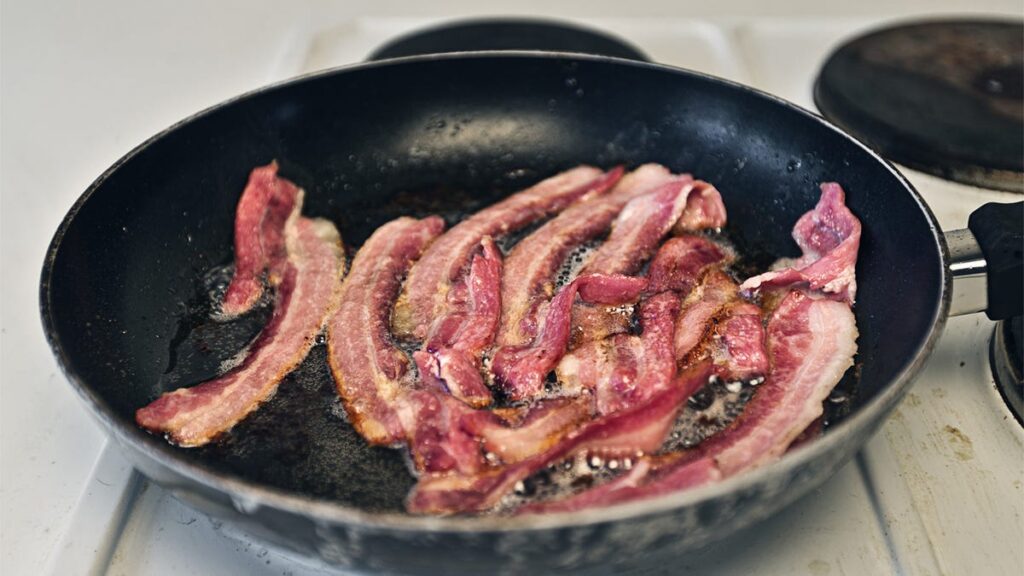 Don’t Waste Bacon Grease: Here Are 9 Ways to Put It to Use bacon in pan
