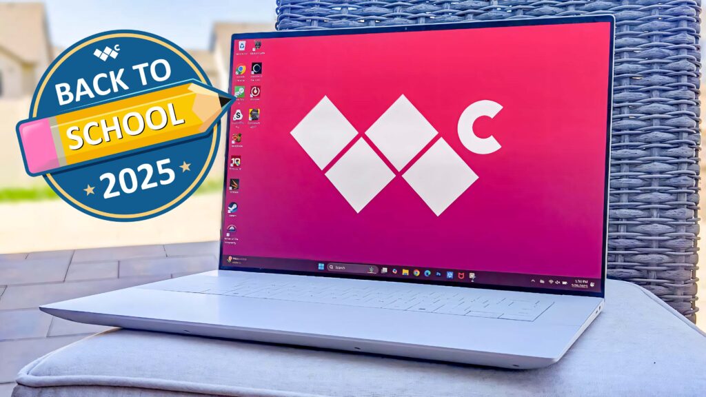 The Dell 16 Premium outside on a cushion with a patio backdrop. The Windows Central logo is on the laptop's background screen. A graphic on the left of the screen says, &quot;Back to School 2025.&quot;