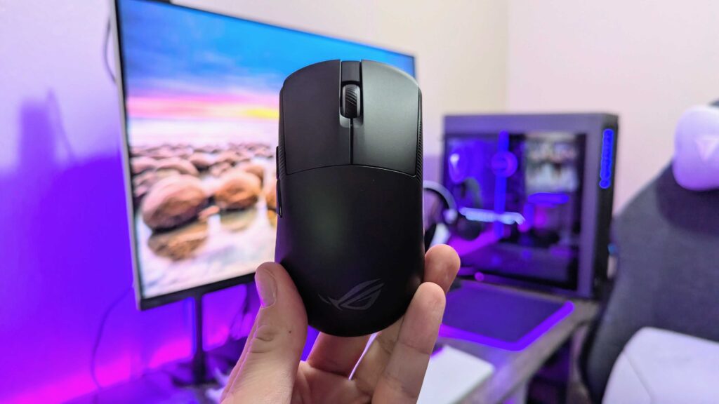 Image of the ASUS ROG Harpe Ace Mini wireless gaming mouse.