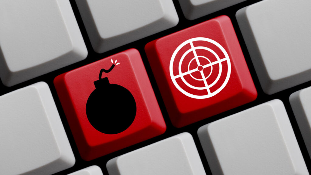 Anthropic will nuke your attempt to use AI to build a nuke A bomb and crosshair on a keyboard.