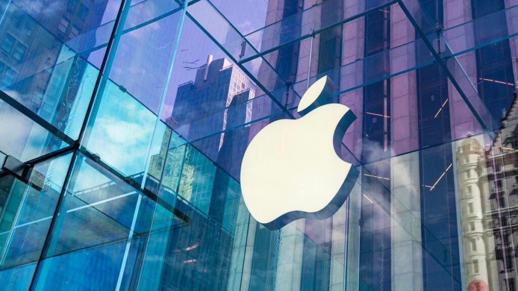 Apple logo on a glass building