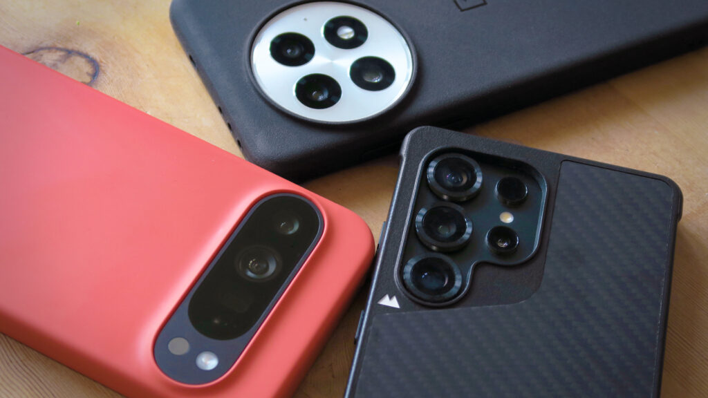 The Google Pixel 9 Pro XL in the Coral Mous case, the OnePlus 13 in its magnetic case and the Samsung Galaxy S25 Ultra in a Mous Limitless case