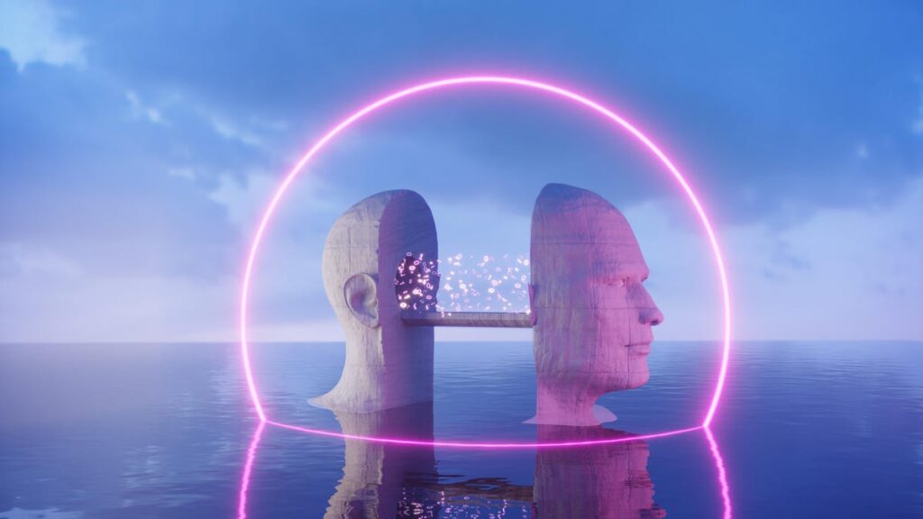 An image of a statue of a head with a purple neon halo on a background of sea and sky gettyimages-1666055933