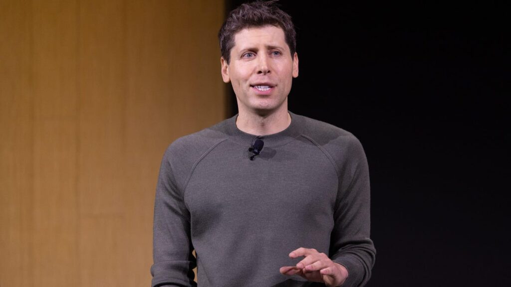 OpenAI CEO Sam Altman speaking at his company&apos;s DevDay event in 2023