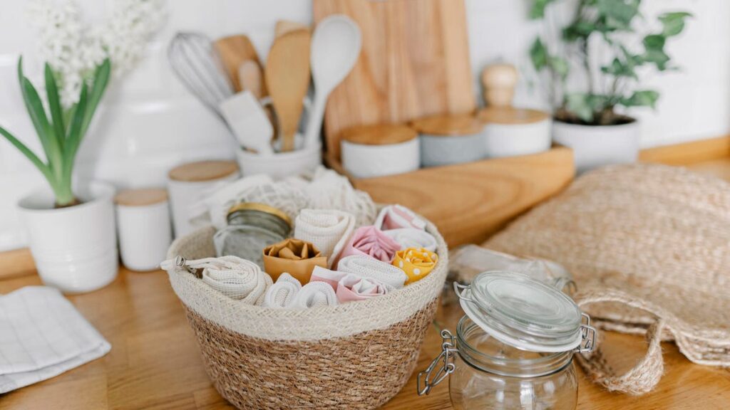 6 Ways to Make Your Kitchen More Eco-Friendly Basket with eco friendly bags lying on kitchen counter