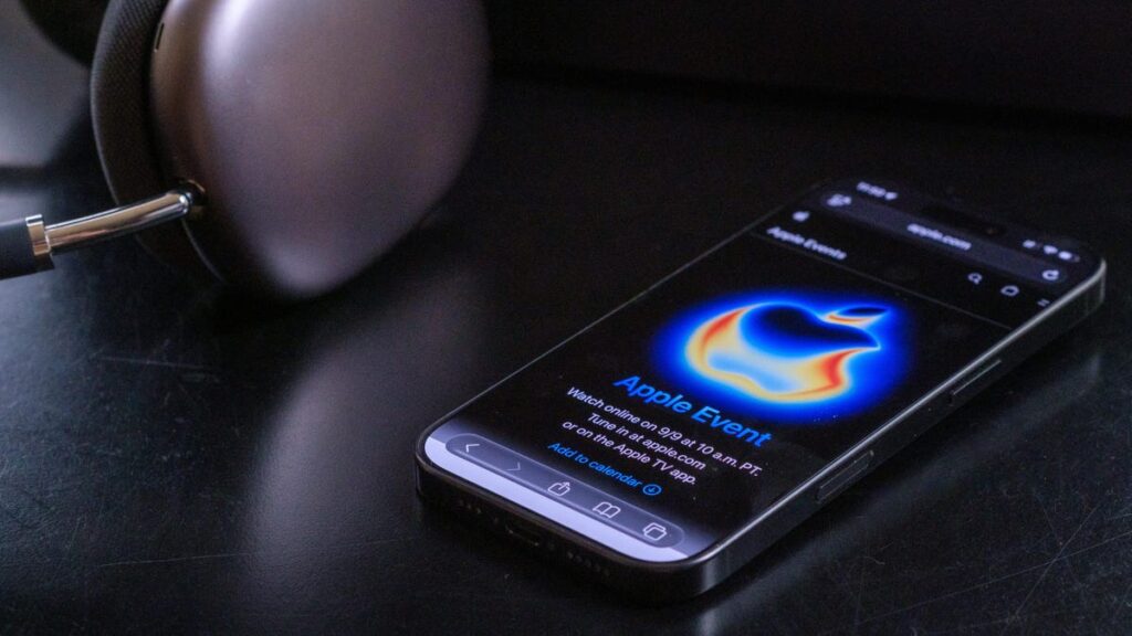 iPhone showing a glowing Apple logo and the words 'Apple Event'