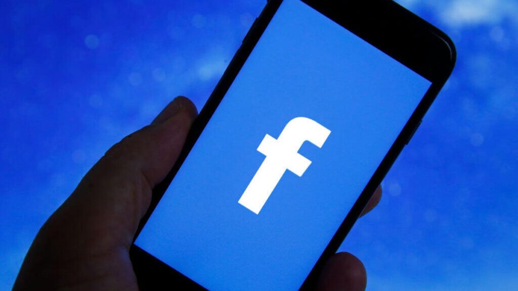 Check Your Bank Accounts, You Might Spot a Deposit From a Facebook Lawsuit facebook-phone-gettyimages-1345139023