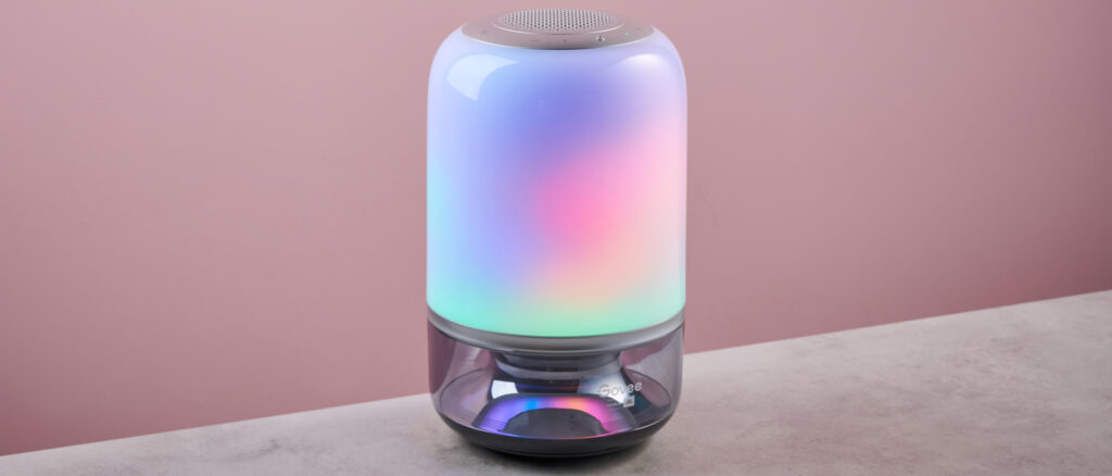 The Govee Table Lamp 2 Pro x Sound by JBL is lit up in green, pink, blue, and orange.