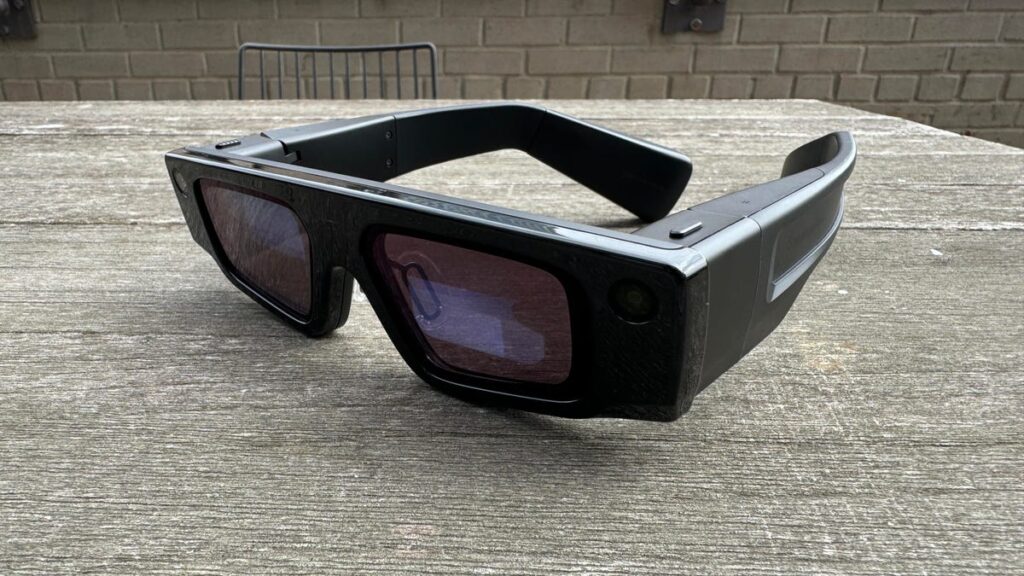 A bulky pair of AR glasses made by Snap on a table
