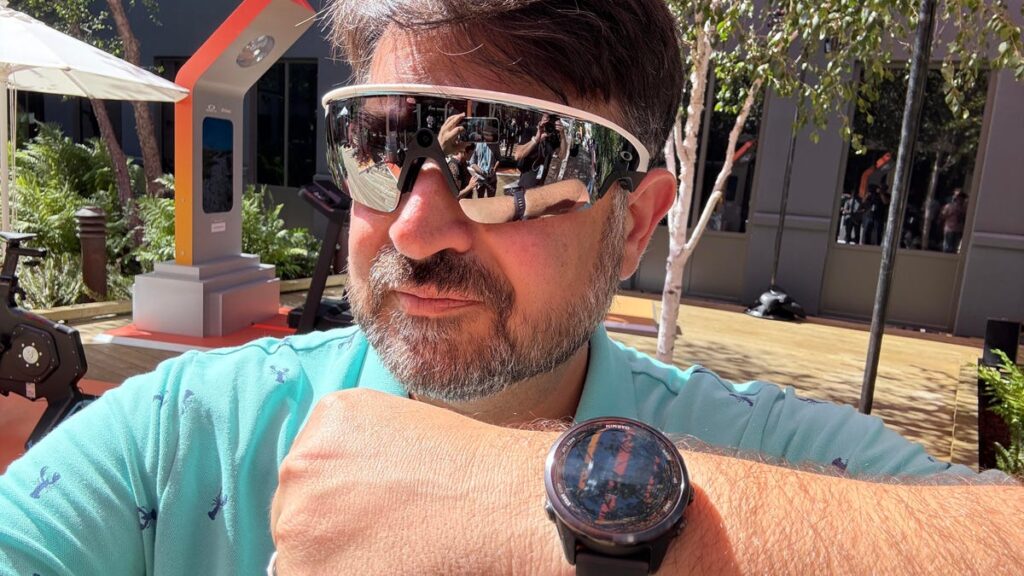 Oakley Meta Vanguard smart glasses worn by CNET's Scott Stein, while wearing a Garmin watch