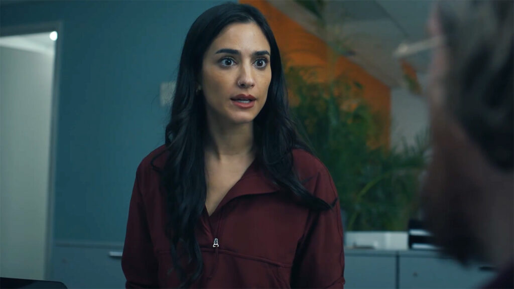 Sasha Bordeaux looking at an off-camera John Economos in Peacemaker season 2 episode 5