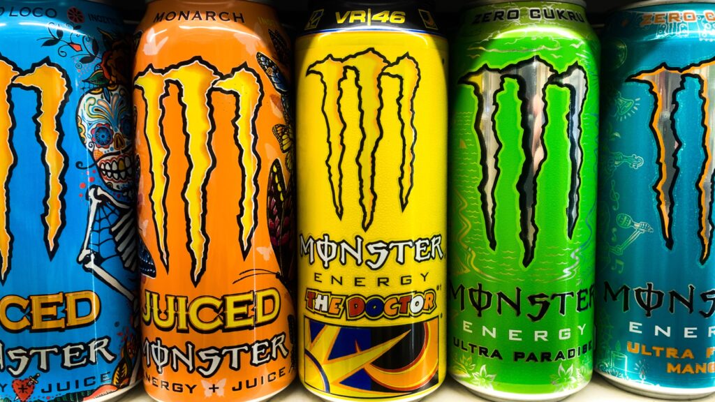 Monster Energy drink cans side-by-side.
