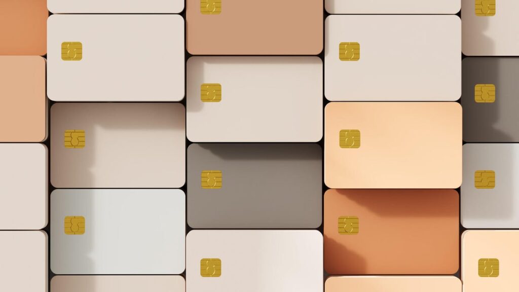 Gray and tan credit cards