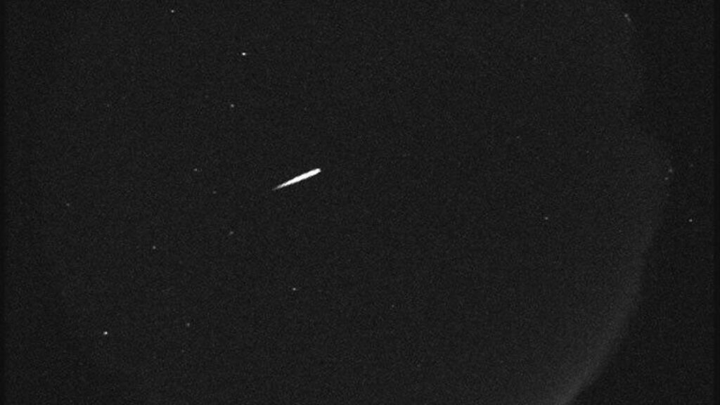 Orionids meteor streaks across a dark sky.
