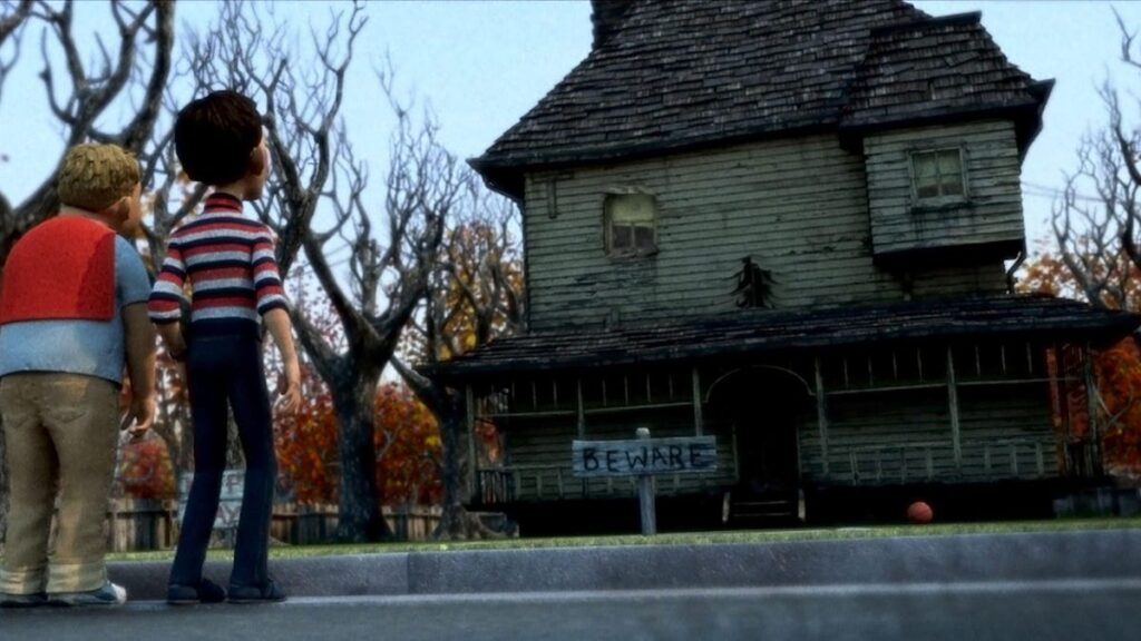 in a still from the animated movie Monster House, two boys stand on the street staring at a dilapidated old house